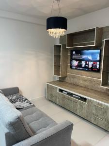 Et tv og/eller underholdning på Skyline - Apto 807 Torre 1 - 3 Quartos