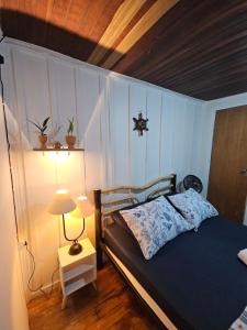 Ένα ή περισσότερα κρεβάτια σε δωμάτιο στο Pousada Nova Brasília Ilha do Mel