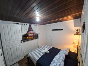 Ένα ή περισσότερα κρεβάτια σε δωμάτιο στο Pousada Nova Brasília Ilha do Mel +8 φωτογραφίες