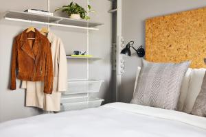 Ένα ή περισσότερα κρεβάτια σε δωμάτιο στο Kasa Lantern Lower East Side