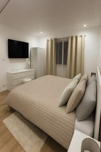 Ένα ή περισσότερα κρεβάτια σε δωμάτιο στο Villa aux portes de Bruxelles