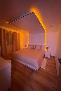 Ένα ή περισσότερα κρεβάτια σε δωμάτιο στο Villa aux portes de Bruxelles