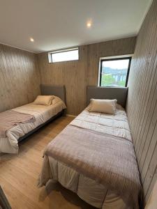 Кровать или кровати в номере Modern and spectacular house in Maitencillo +45 фотографий