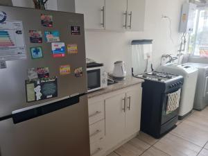 Køkken eller tekøkken på Arriendo La Serena + 4 billeder