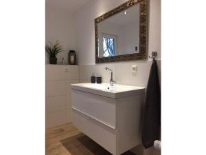 Koupelna v ubytování Biebernest Comfortable holiday residence + 13 fotografií