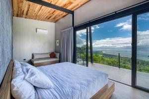 En eller flere senge i et værelse på Exclusive Luxury Designer villa Oceanview - HR6 - Concierge