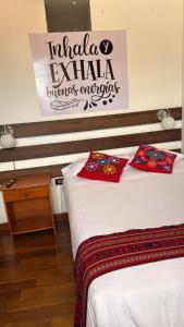 En eller flere senge i et værelse på All sur departamento