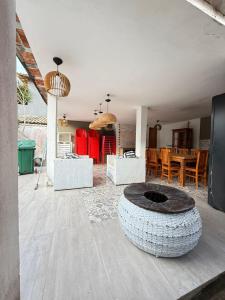 Et opholdsområde på Casa Dois Amores - Espaço, Lazer e Natureza