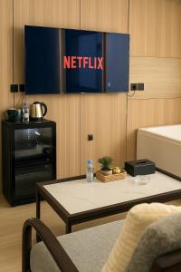 Et tv og/eller underholdning på إقامة فاخرة للأزواج - Self entry