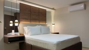 Postel nebo postele na pokoji v ubytování One Apartments Provenza