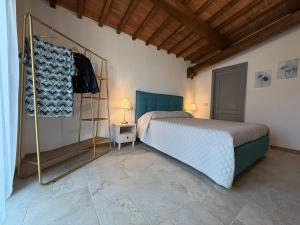 Кровать или кровати в номере Inviting apartment in Poppi with patio +30 фотографий