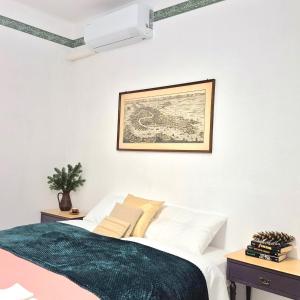 Ένα ή περισσότερα κρεβάτια σε δωμάτιο στο Villa Due Cieli 2