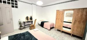 Ένα ή περισσότερα κρεβάτια σε δωμάτιο στο Villa Due Cieli 2