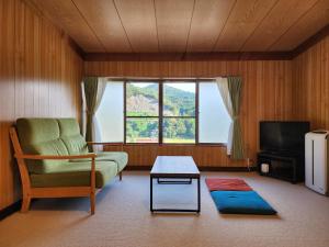 Χώρος καθιστικού στο 民宿やいち