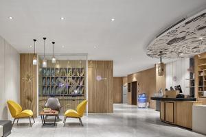 Khu vực ghế ngồi tại Hanting Premium Hotel Nanjing Jiangpu Research Park