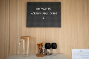 Πιστοποιητικό, βραβείο, πινακίδα ή έγγραφο που προβάλλεται στο Aorangi Peak Cabins 4 by Tiny Away