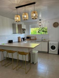 Kuchyň nebo kuchyňský kout v ubytování Villa Altura