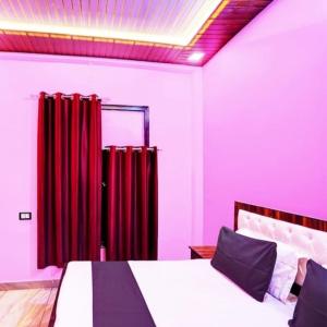 En eller flere senge i et værelse på Hotel Royal Vista