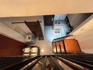 an overhead view of a staircase in a building at Tim's Guest House in Butuan