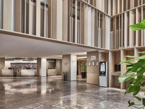 a rendering of the lobby of a building at Novotel Singapore on Kitchener in Singapore +62 photos