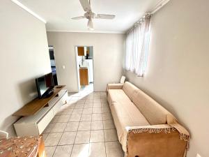 Μια τηλεόραση ή/και κέντρο ψυχαγωγίας στο Apartamento em Piracicaba à 7min do centro