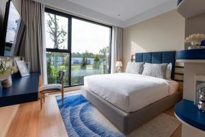 Postel nebo postele na pokoji v ubytování The Sóng - Tumys home