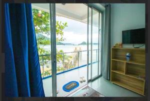 Fotografie z fotogalerie ubytování Taguilon Hidden Beach Cove Resort 