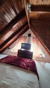 Et tv og/eller underholdning på Cabaña Miss sueños