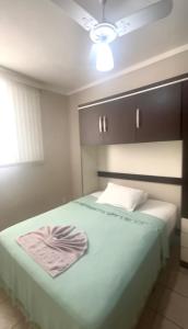 Ένα ή περισσότερα κρεβάτια σε δωμάτιο στο Apartamento em Piracicaba à 7min do centro