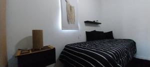 Кровать или кровати в номере Mecohue