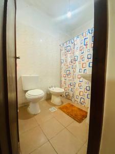 Et badeværelse på Hospedaje Loli + 4 billeder