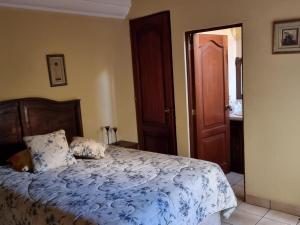 Ένα ή περισσότερα κρεβάτια σε δωμάτιο στο Casa San Lázaro