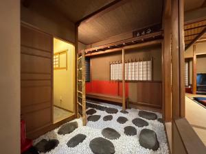 Postel nebo postele na pokoji v ubytování シェール松岡