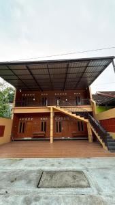 En balkon eller terrasse på Homestay Permana Syariah