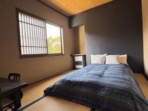 Giường trong phòng chung tại Fuji-Kurohime- +4 ảnh