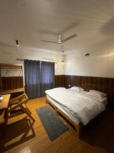 En eller flere senge i et værelse på 2BHK apartment CERRO TORRE