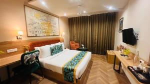 TV a/nebo společenská místnost v ubytování Saltstayz Select- Medicity Near Medanta Hospital