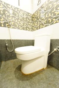 Et badeværelse på Sharsh Banquet and Hotel