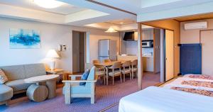 Postel nebo postele na pokoji v ubytování Seagaia Forest Condominiums + 16 fotografií