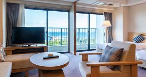 TV a/nebo společenská místnost v ubytování Seagaia Forest Condominiums