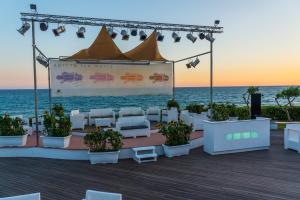 a tent set up for a wedding on the beach at Holiday Village in Fondi