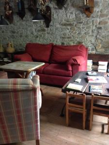 Posezení v ubytování La Casa Del Reloj