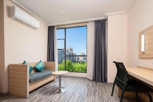 Χώρος καθιστικού στο City Comfort Inn Wuhan Panlongcheng Baishang Shopping Center