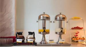 a kitchen with two coffee makers on a counter at City Comfort Inn Yichang Dongshan Three Gorges University Shuiyuecheng in Yichang