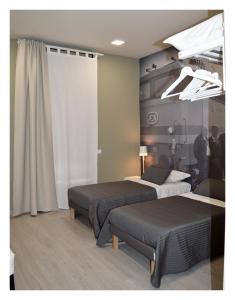 Postel nebo postele na pokoji v ubytování B&B Stazione Dittaino