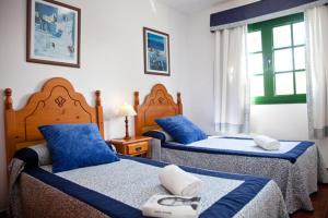 Postel nebo postele na pokoji v ubytování Villas Bocaina Beach + 37 fotografií