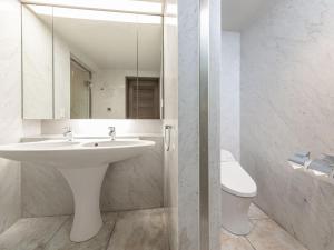 Koupelna v ubytování Izumigo Kiyosato Kogen Hotel