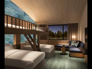 Postel nebo postele na pokoji v ubytování Izumigo Kiyosato Kogen Hotel