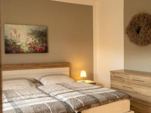 Ένα ή περισσότερα κρεβάτια σε δωμάτιο στο Jahnstraße 37 - Ferienwohnung Hufnagel