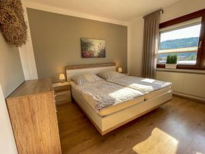 Ένα ή περισσότερα κρεβάτια σε δωμάτιο στο Jahnstraße 37 - Ferienwohnung Hufnagel